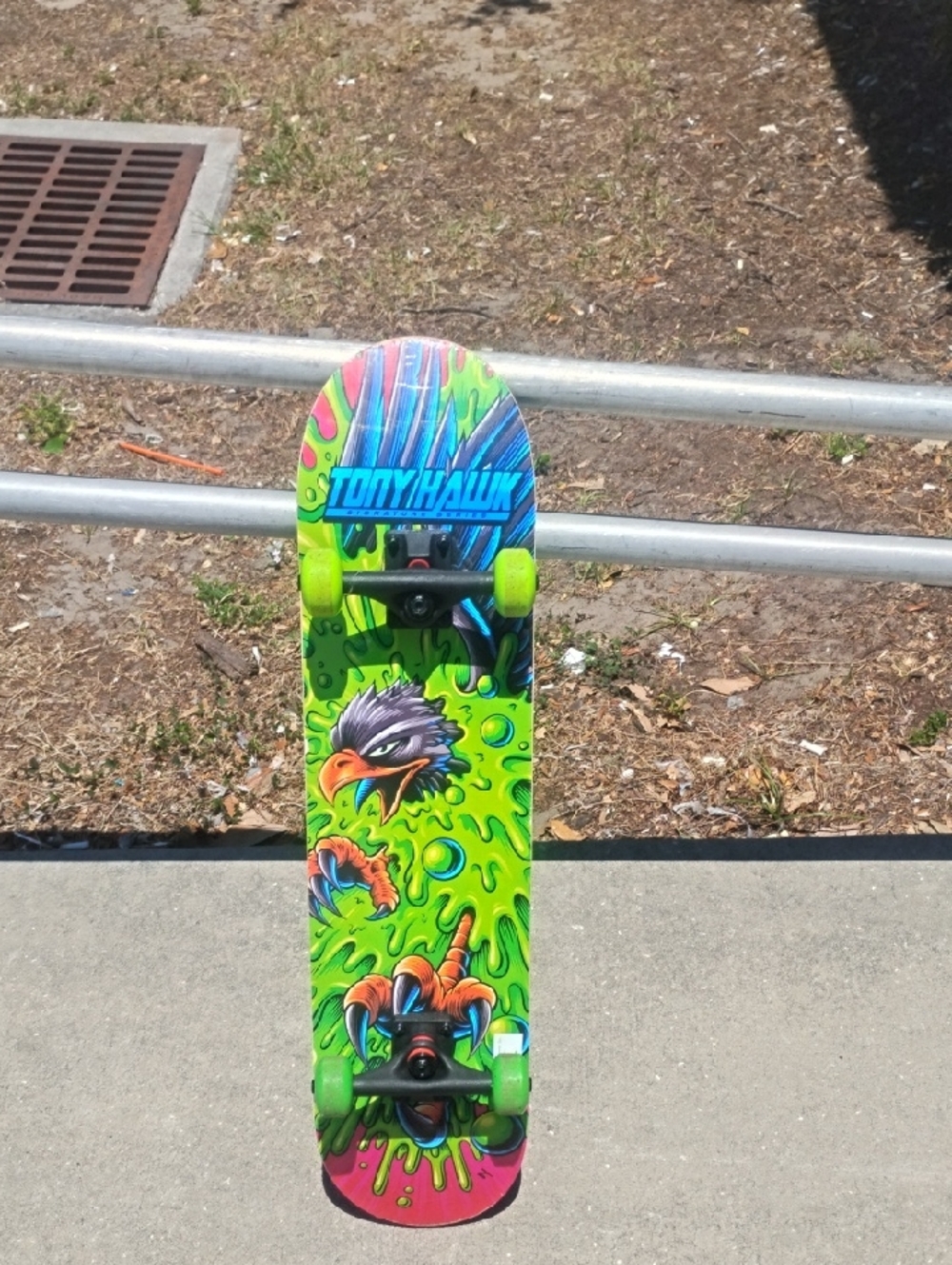 Tony Hawk Neon Green and Blue Kids Skateboard with Eagle Graphic